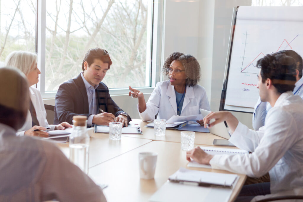 healthcare leaders at a conference table