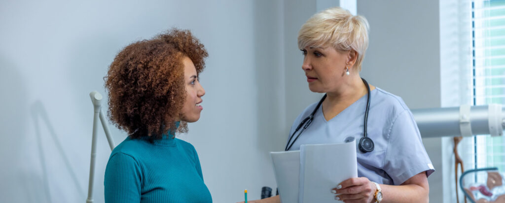 Patient speaking with a doctor