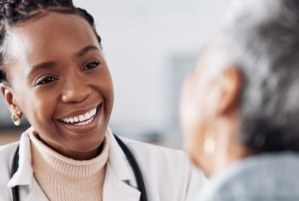 female doctor with an older patient