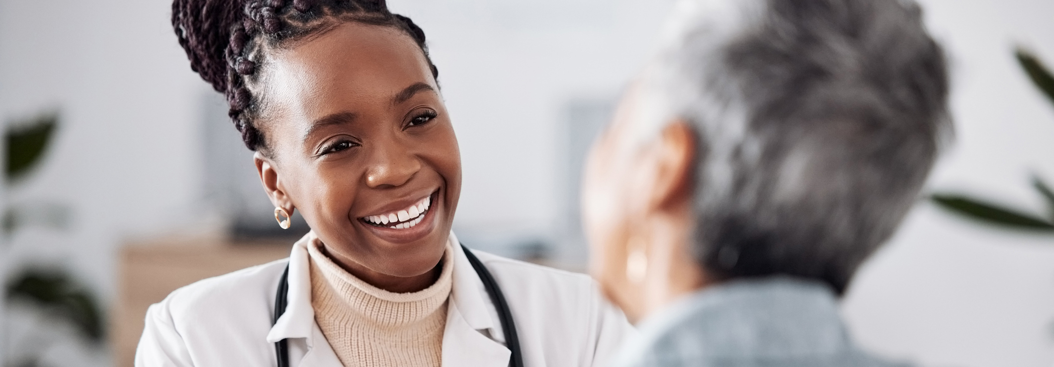 female doctor with an older patient